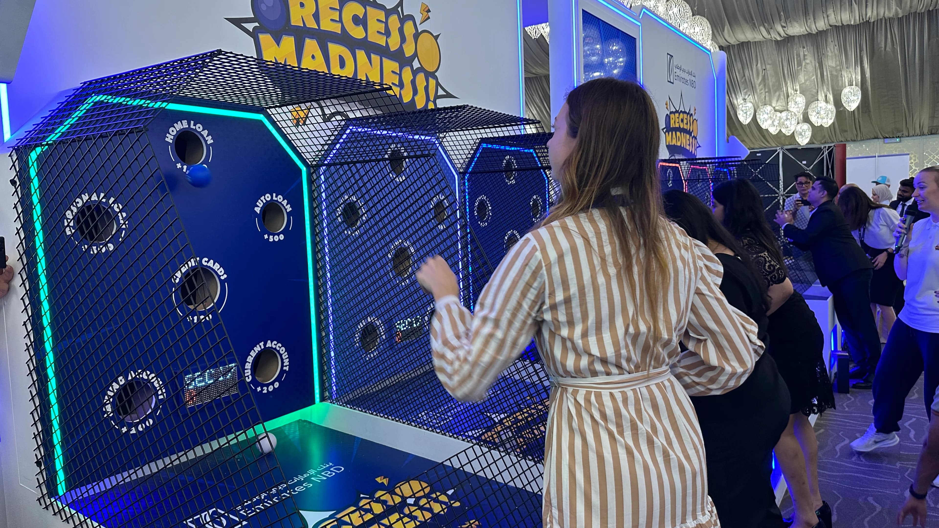 Teachers playing Recess Madness, an arcade-inspired experiential marketing activation for Emirates NBD. Teachers playing Recess Madness, an arcade-inspired experiential marketing activation for Emirates NBD.