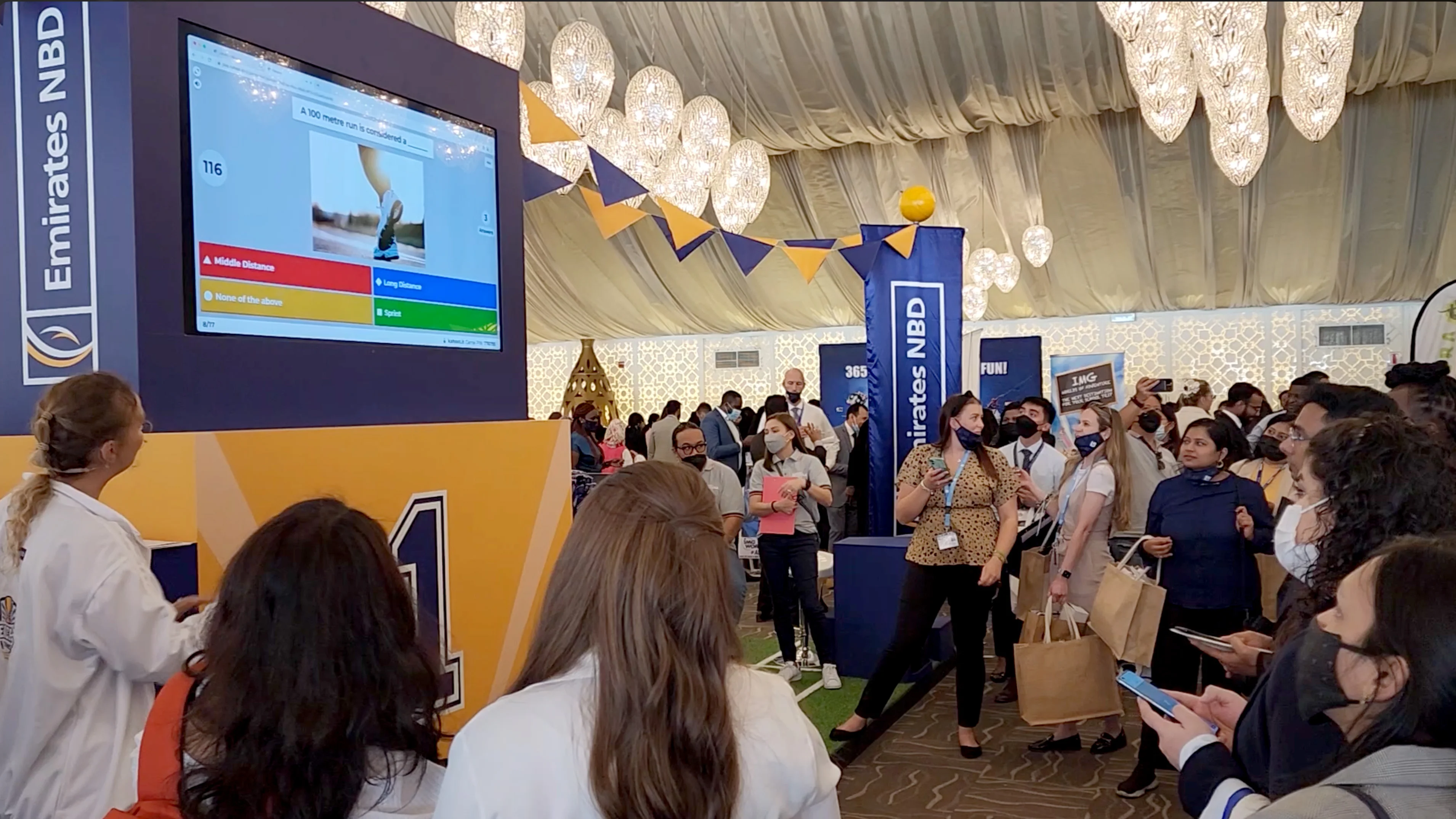 Teachers taking part in Teacher Tourney, a sports day-inspired Emirates NBD activation designed by Almost Impossible. Teachers taking part in Teacher Tourney, a sports day-inspired Emirates NBD activation designed by Almost Impossible.