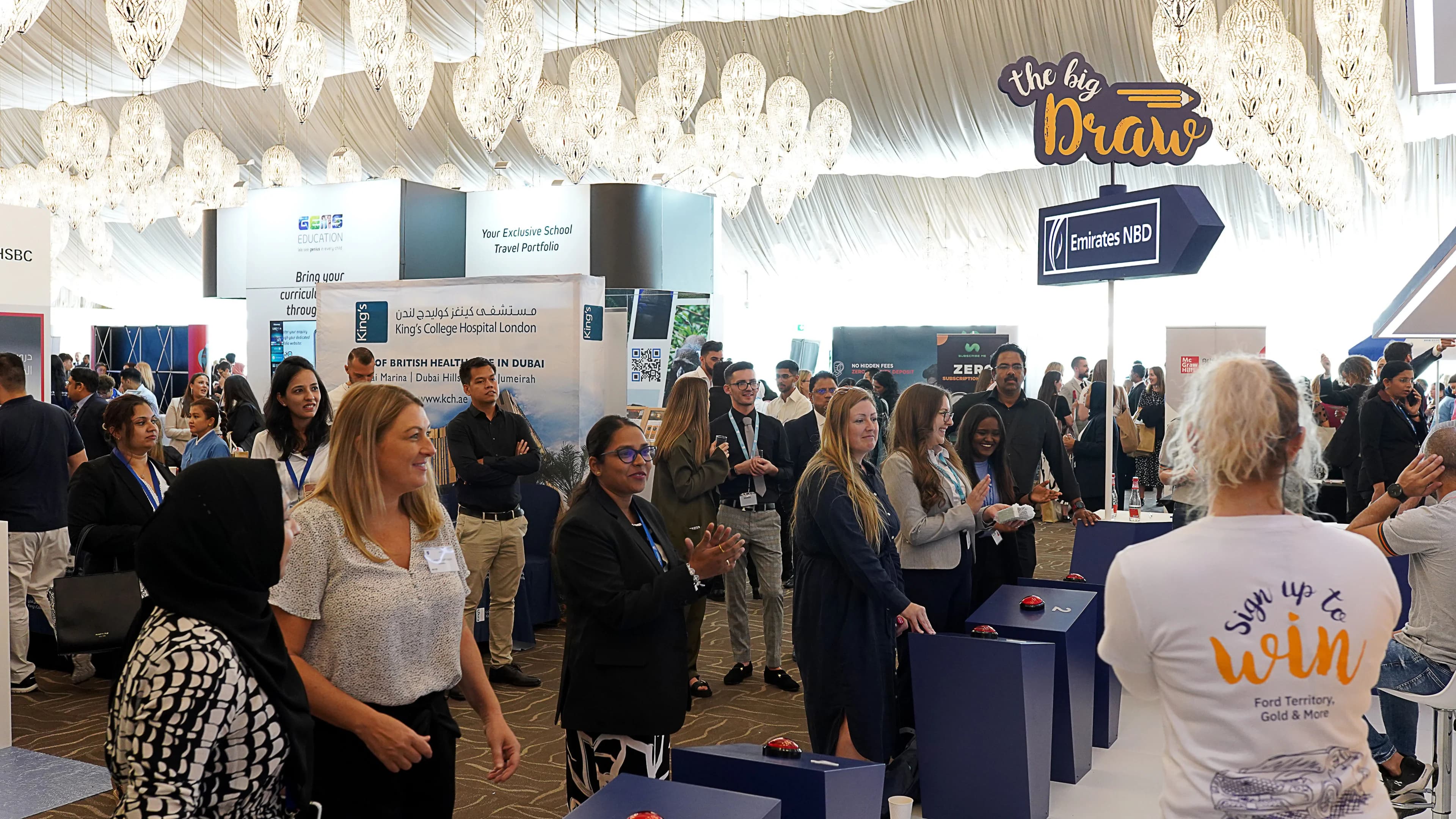Teachers competing in The Big Draw interactive illustration game during Emirates NBD’s GEMS Awareness Day activation. Teachers competing in The Big Draw interactive illustration game during Emirates NBD’s GEMS Awareness Day activation.
