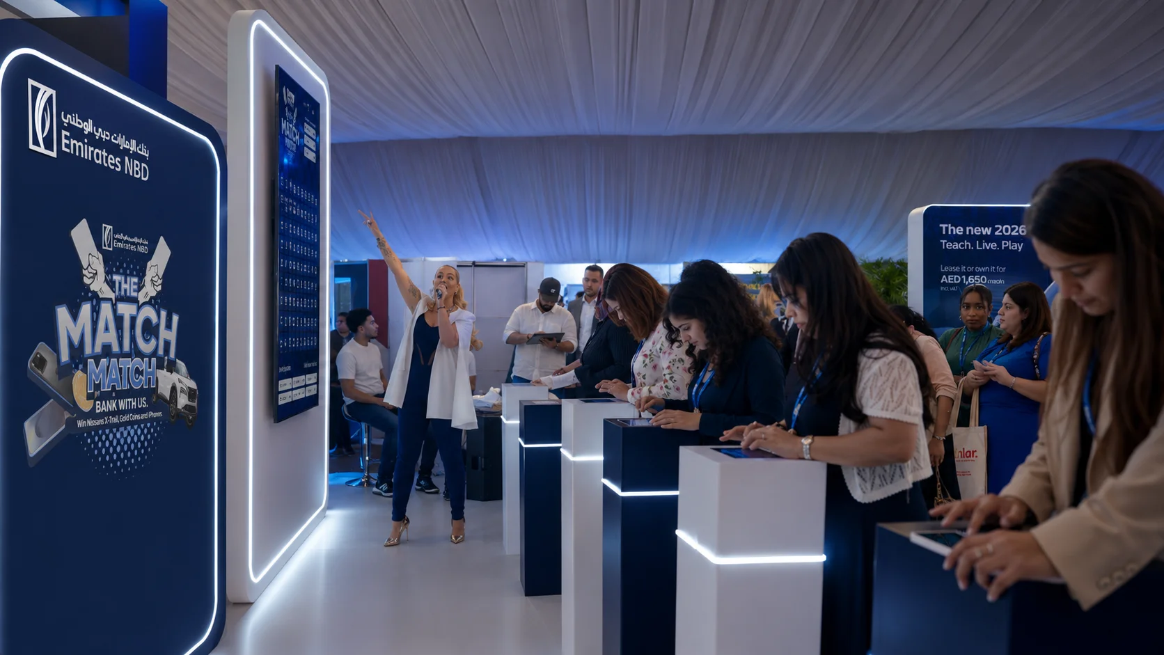 Teachers competing in Match Match, a multiplayer tablet activation for Emirates NBD at GEMS Awareness Day. Teachers competing in Match Match, a multiplayer tablet activation for Emirates NBD at GEMS Awareness Day.